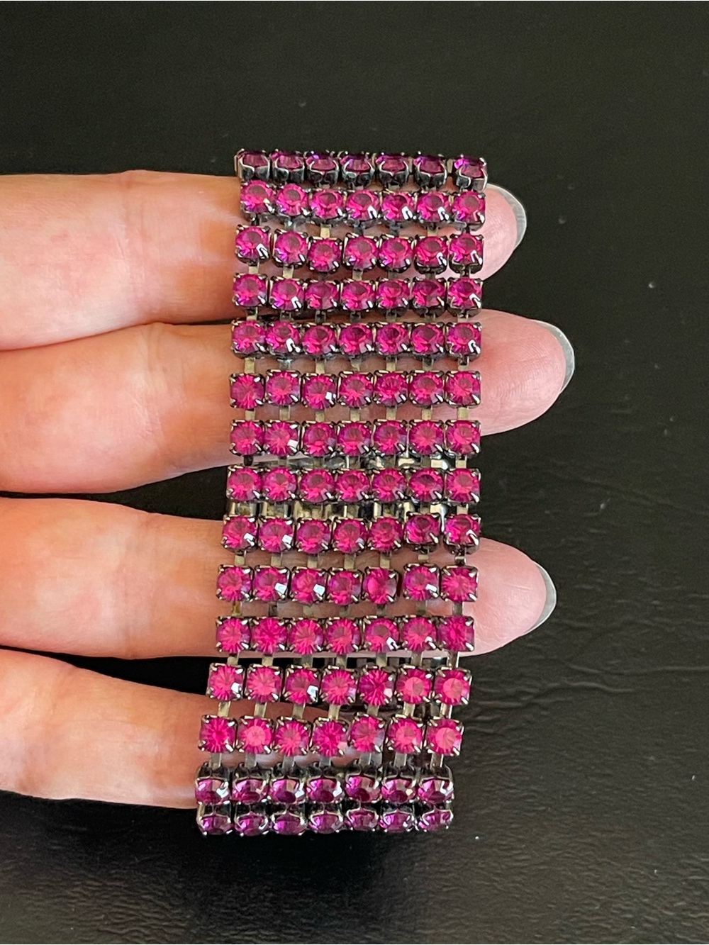 multi row hot pink rhinestone bracelet.